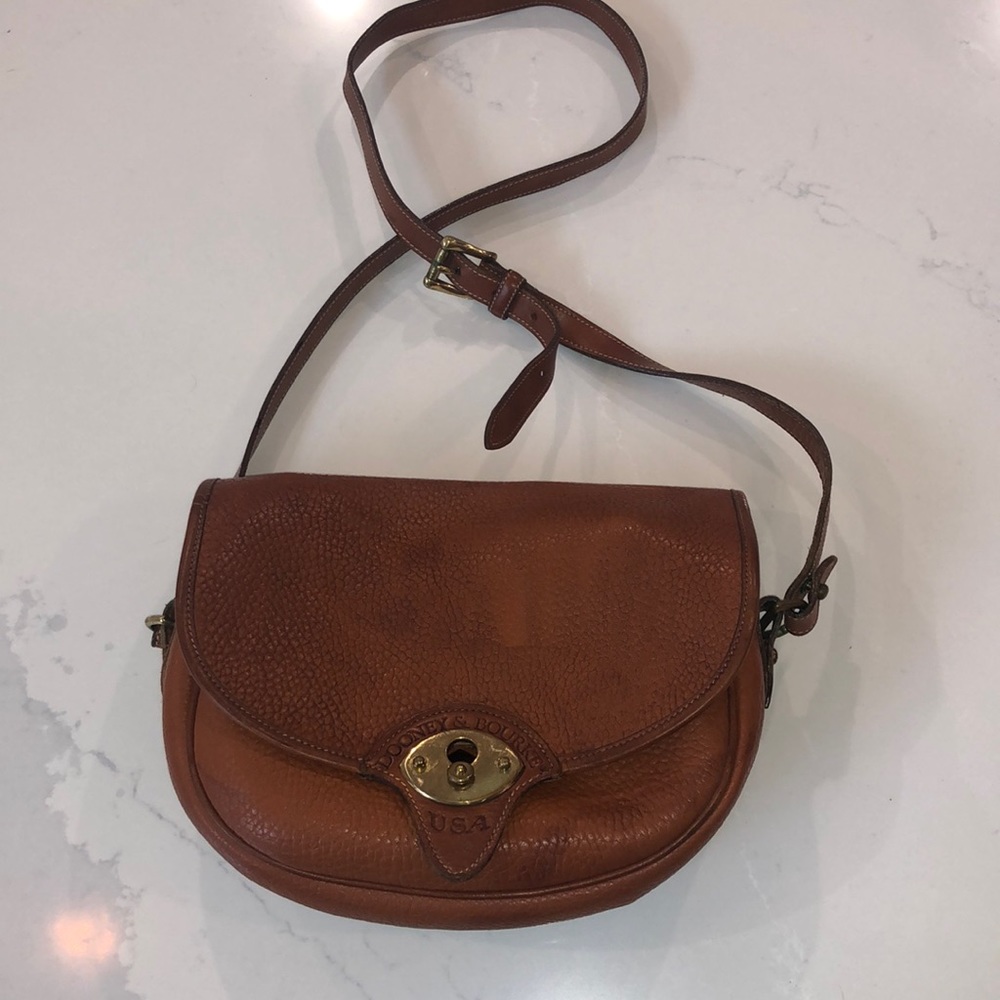 Vintage Dooney & Bourke cross body saddle bag.